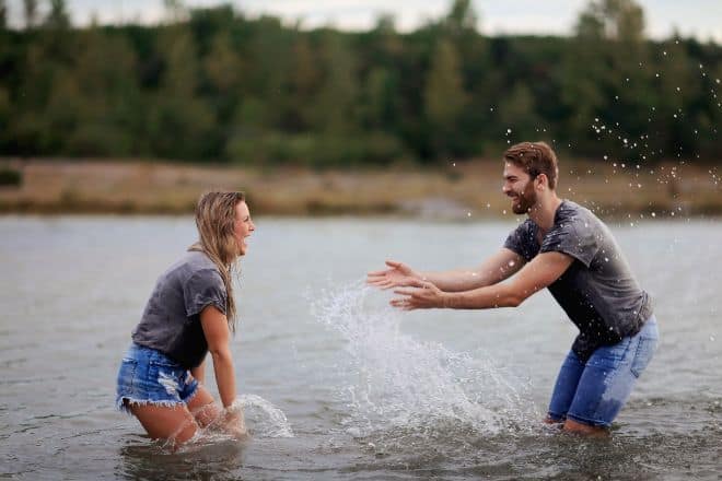 Man and woman enjoying the waters. - funny questions to ask a girl - top 1