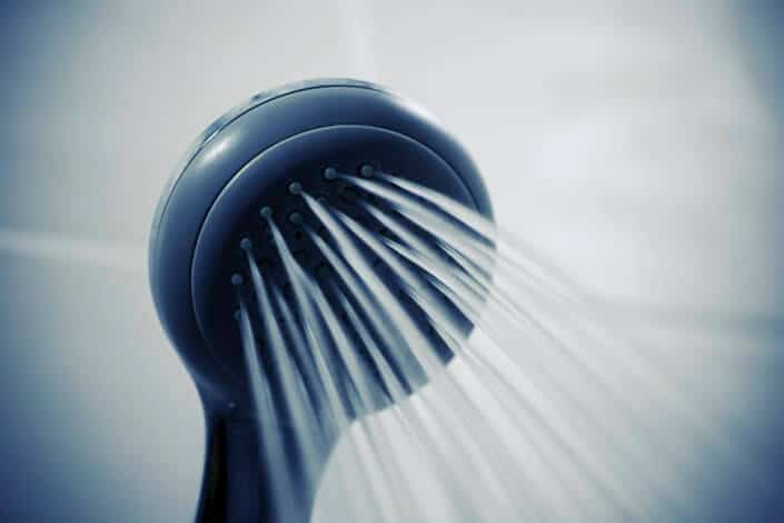 Showerhead releasing water.