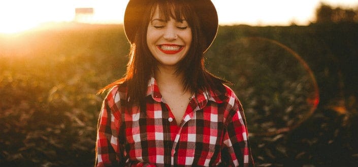Girl in red smiling