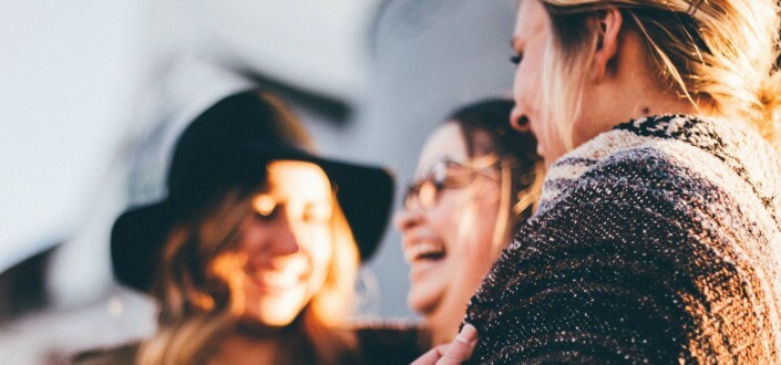 Three girl friends hanging out and enjoying