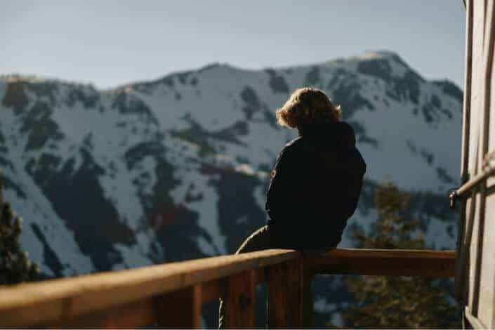 Person sitting on the edge