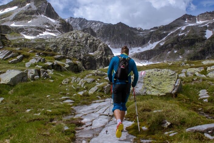 man hiking on rocky mountain