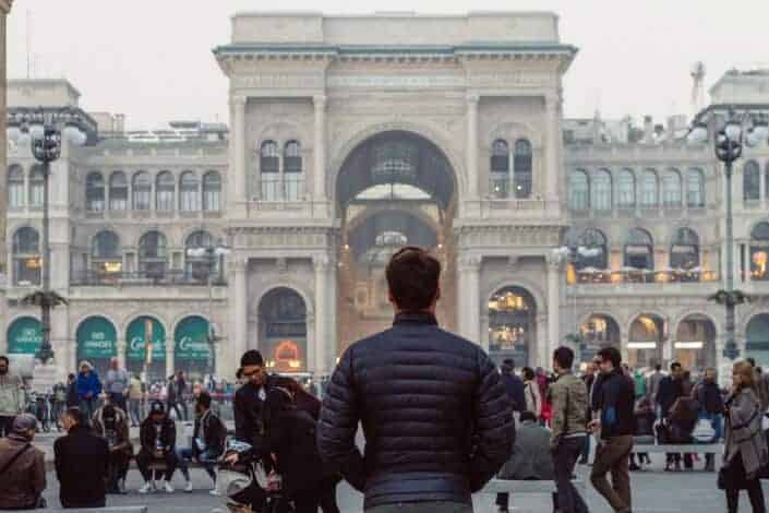 A man facing a crowd.