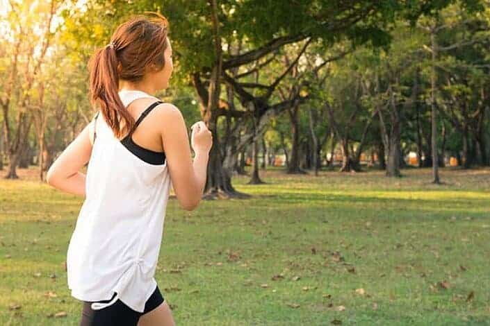 woman exercising brightly