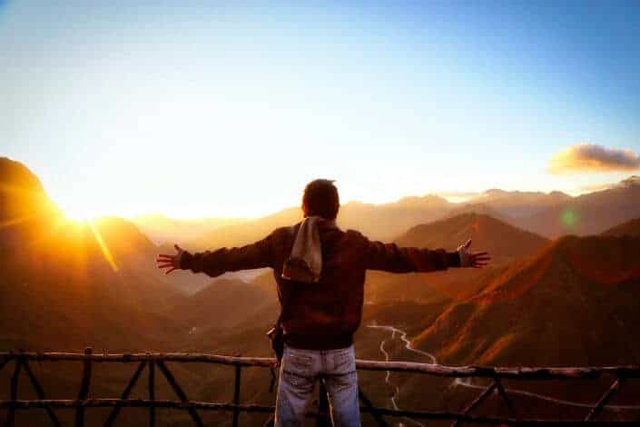 Man enjoying the beautiful sunrise.