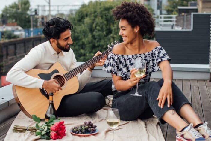 Couple having a date on a rooftop