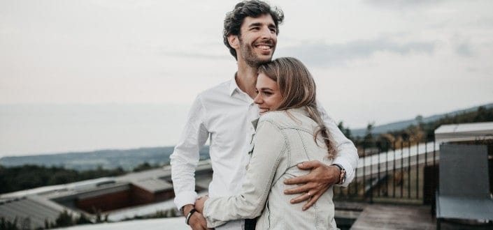 woman hugging a man