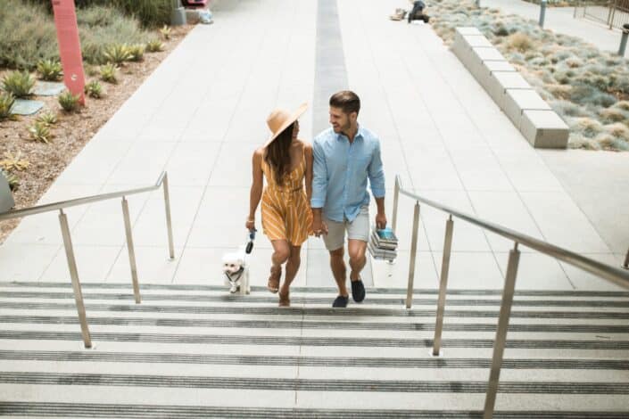 romantic-couple-walking-up-stairs-pexels
