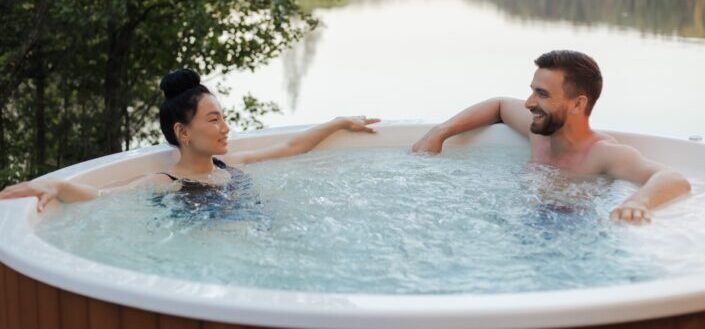 couple-looking-at-each-other-while-relaxing-in-a-jacuzzi-pexels