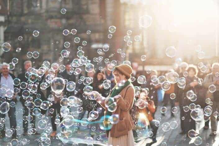 Woman playing with bubbles