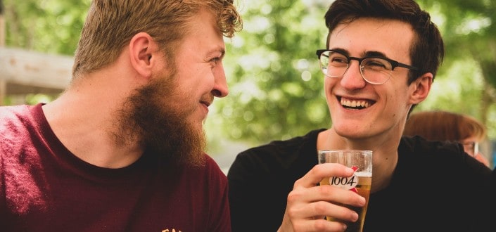 two men laughing together