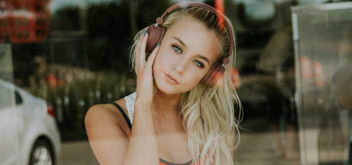 Girl listening to music with headphones