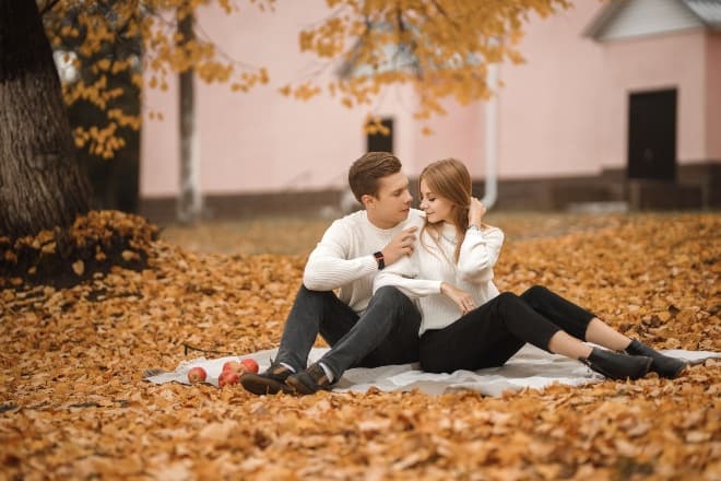 A couple wearing white at a picnic - Main