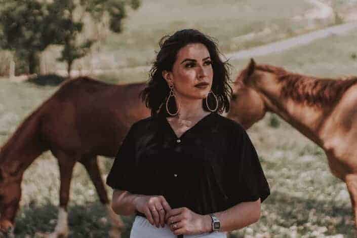 Woman in the horse farm