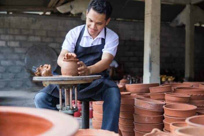 Man making clay pots