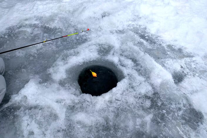 unique date ideas - ice fishing Pexels/Jake Hansen