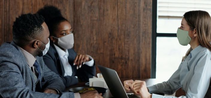 Office workers wearing face masks