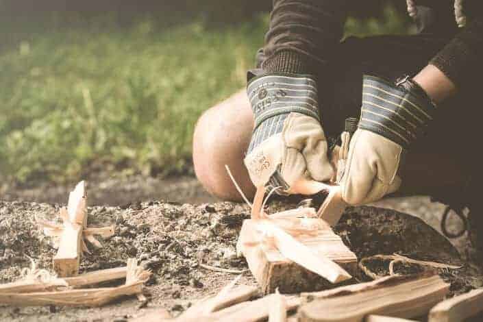 person making firewood