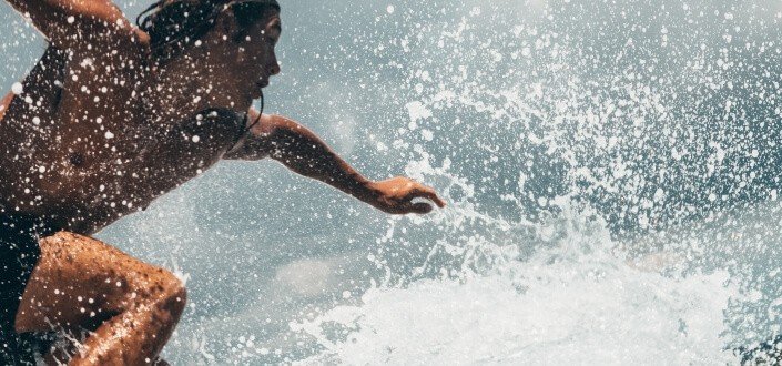 man surfing in the ocean