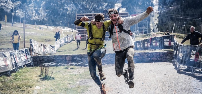 Two men jumping and celebrating