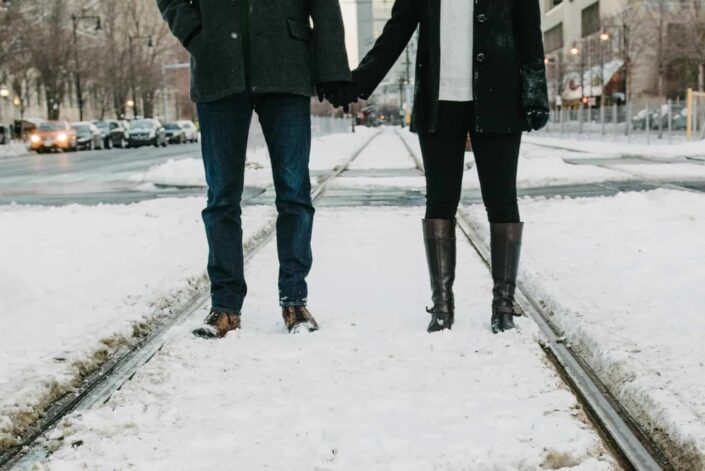 couple holding hands together