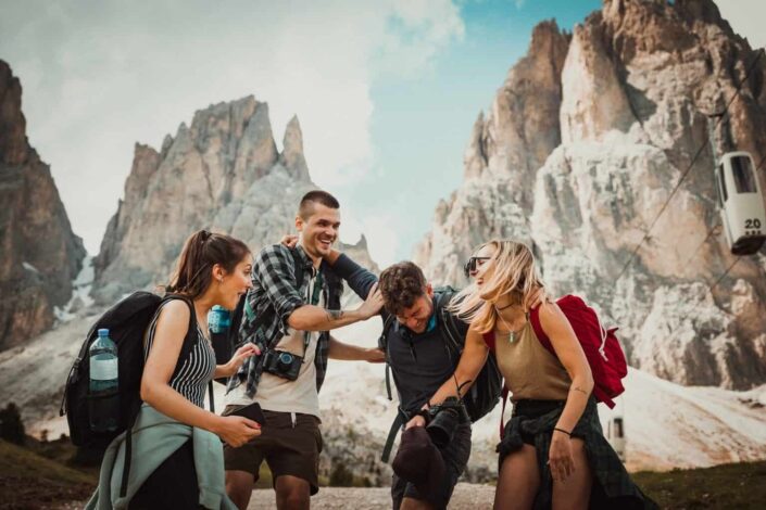 Friends laughing together in mountain