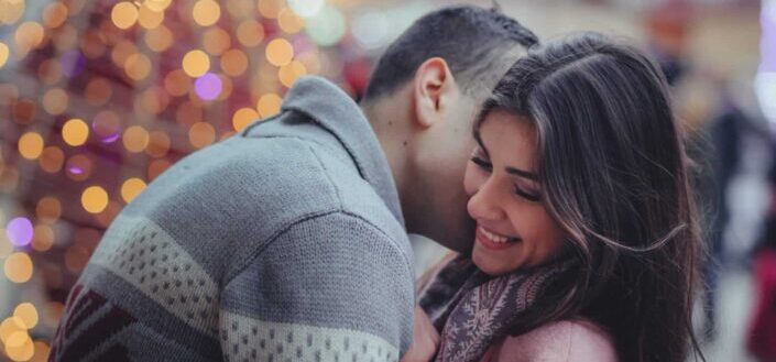 Man Kissing His Girlfriend's Neck