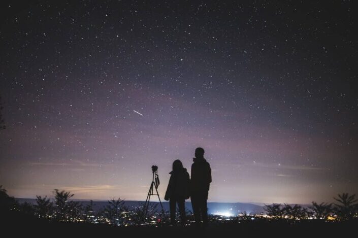 Couple star gazing together