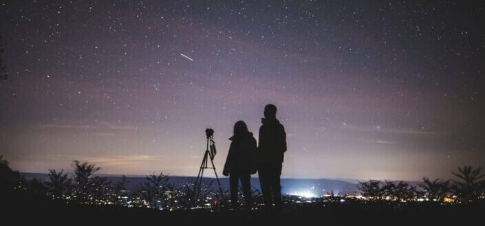 Couple star gazing together.
