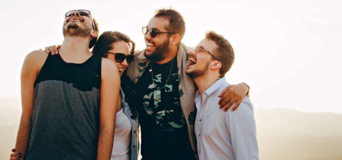 Cheerful friends laughing together