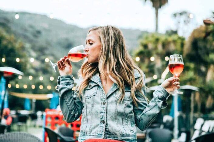 Woman Drinking Wine Outdoors