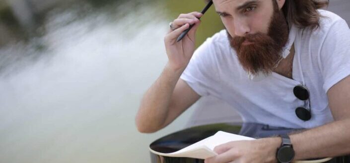 Serious bearded man thinking deeply