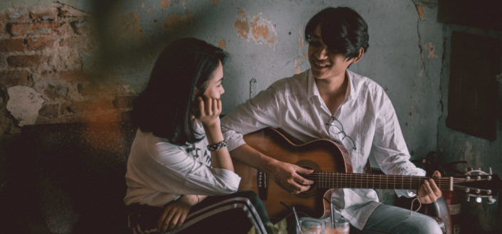 man-playing-guitar-with-girl-stockpack-pexels.jpeg