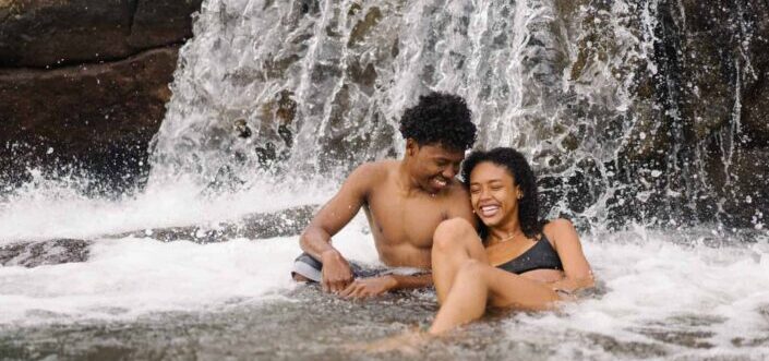 Couple Enjoying The Waterfalls