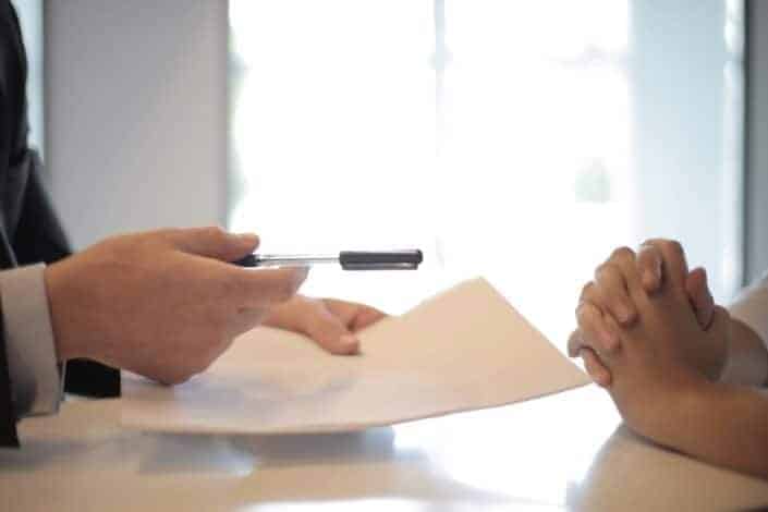 An applicant being interviewed by an employer.