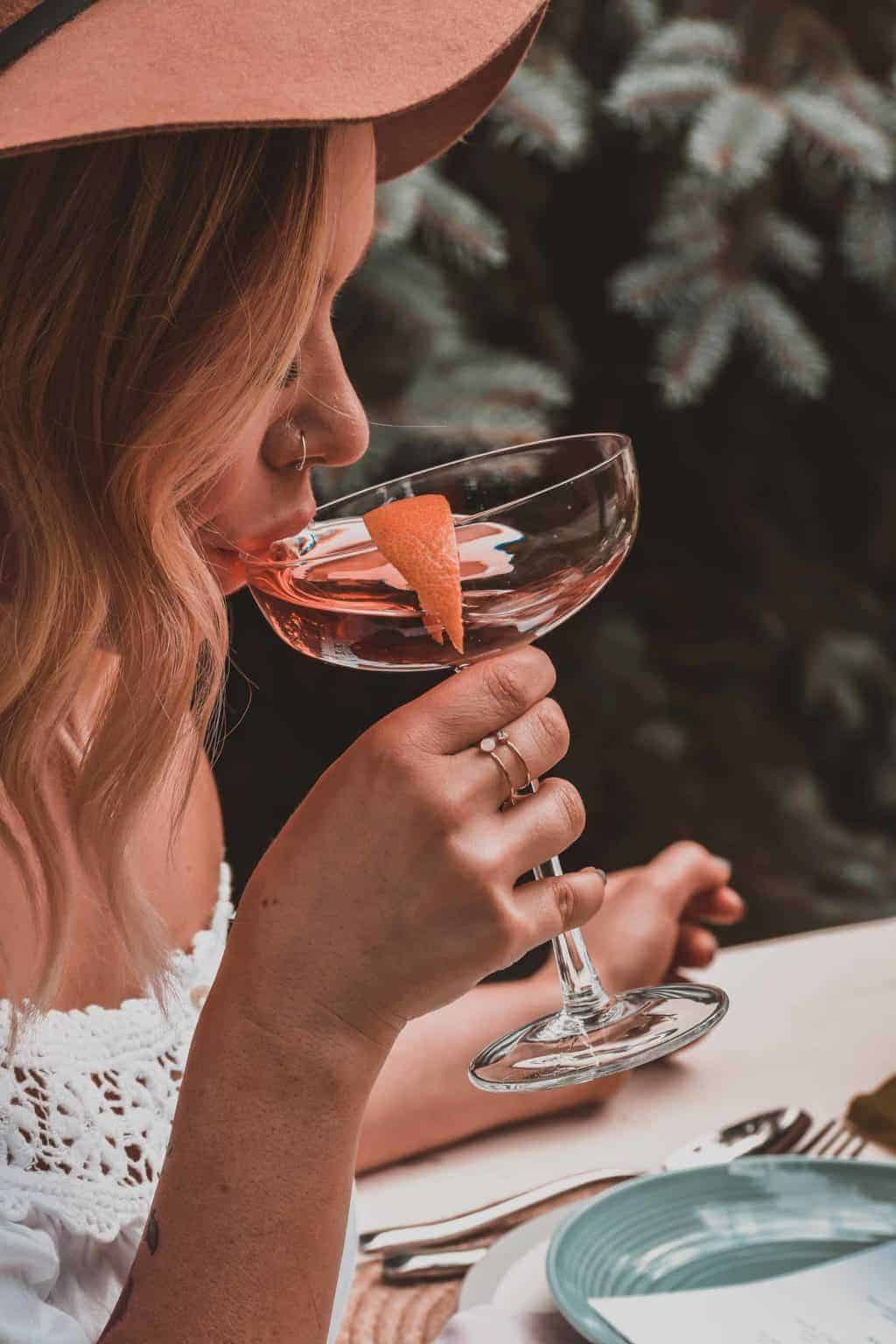 woman sipping wine