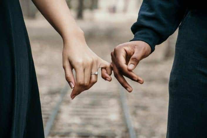 Couple having pinky promise