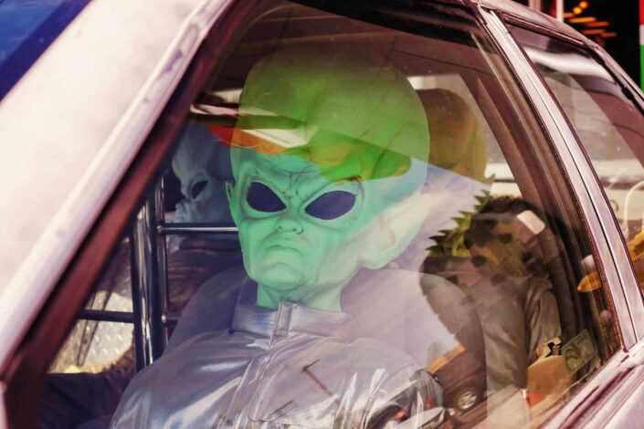 An alien inside a car