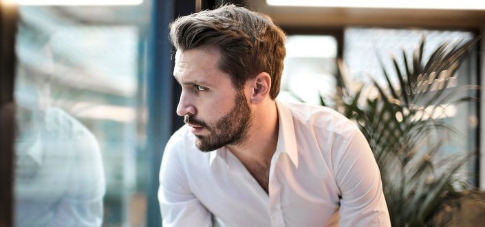 Guy in white long sleeves polo