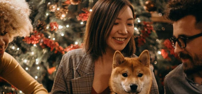 Woman Holding Dog