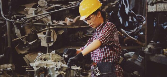 Woman wearing yellow hard hat