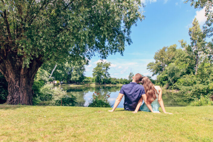 Couple sitting on a grass