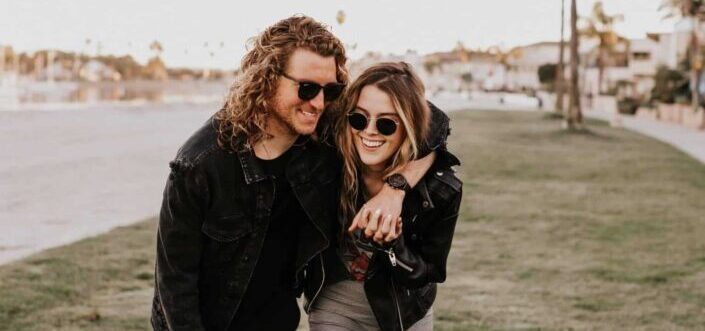 Couple Having Fun Together Beside The Street