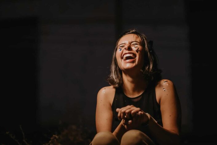 Girl smiling with stickers on her face