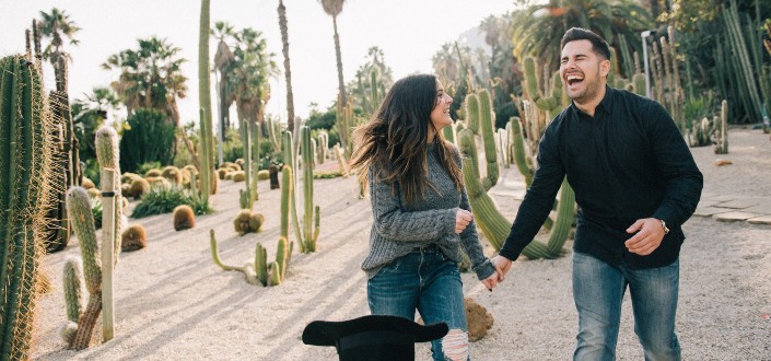 couple walking together at a cactus farm