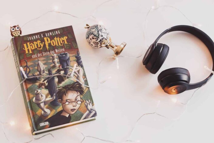 harry potter book and headphones