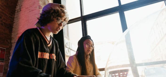 teenagers playing arcades