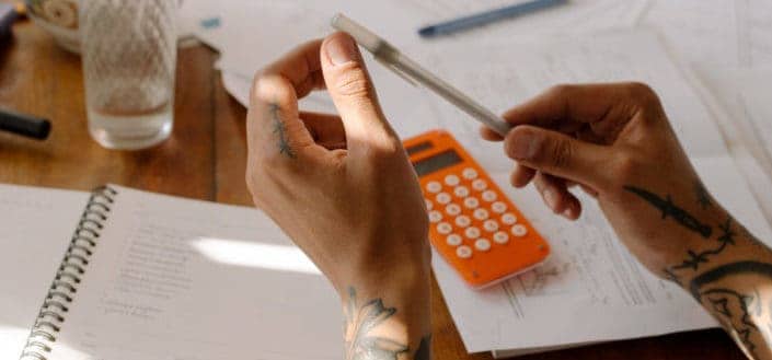 person holding a pen