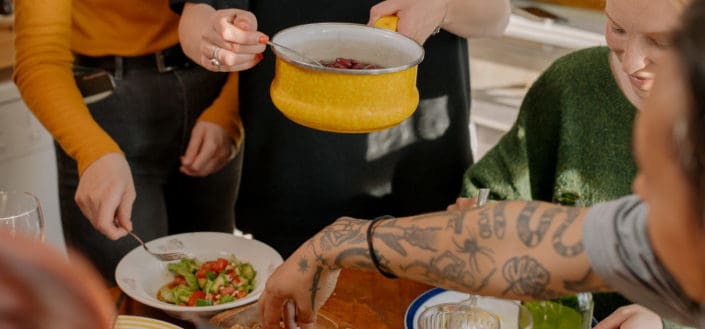 People preparing food together