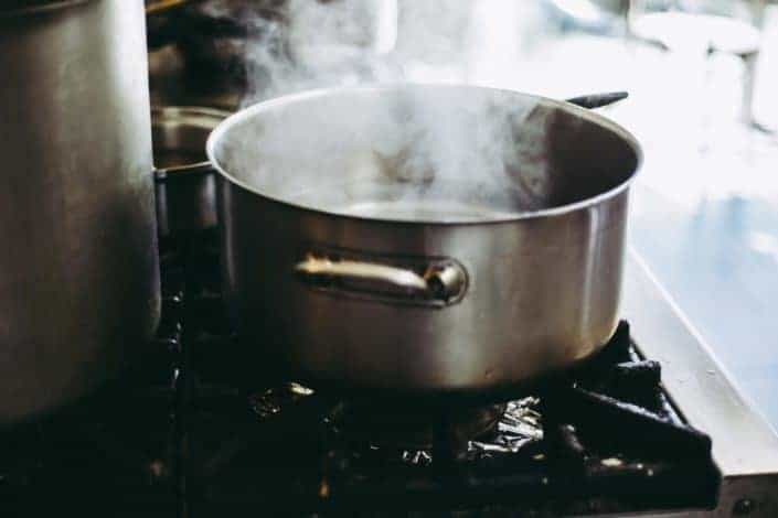 boiling water in stainless steel cooking pot